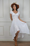 Dress with sleeves and handkerchief hem